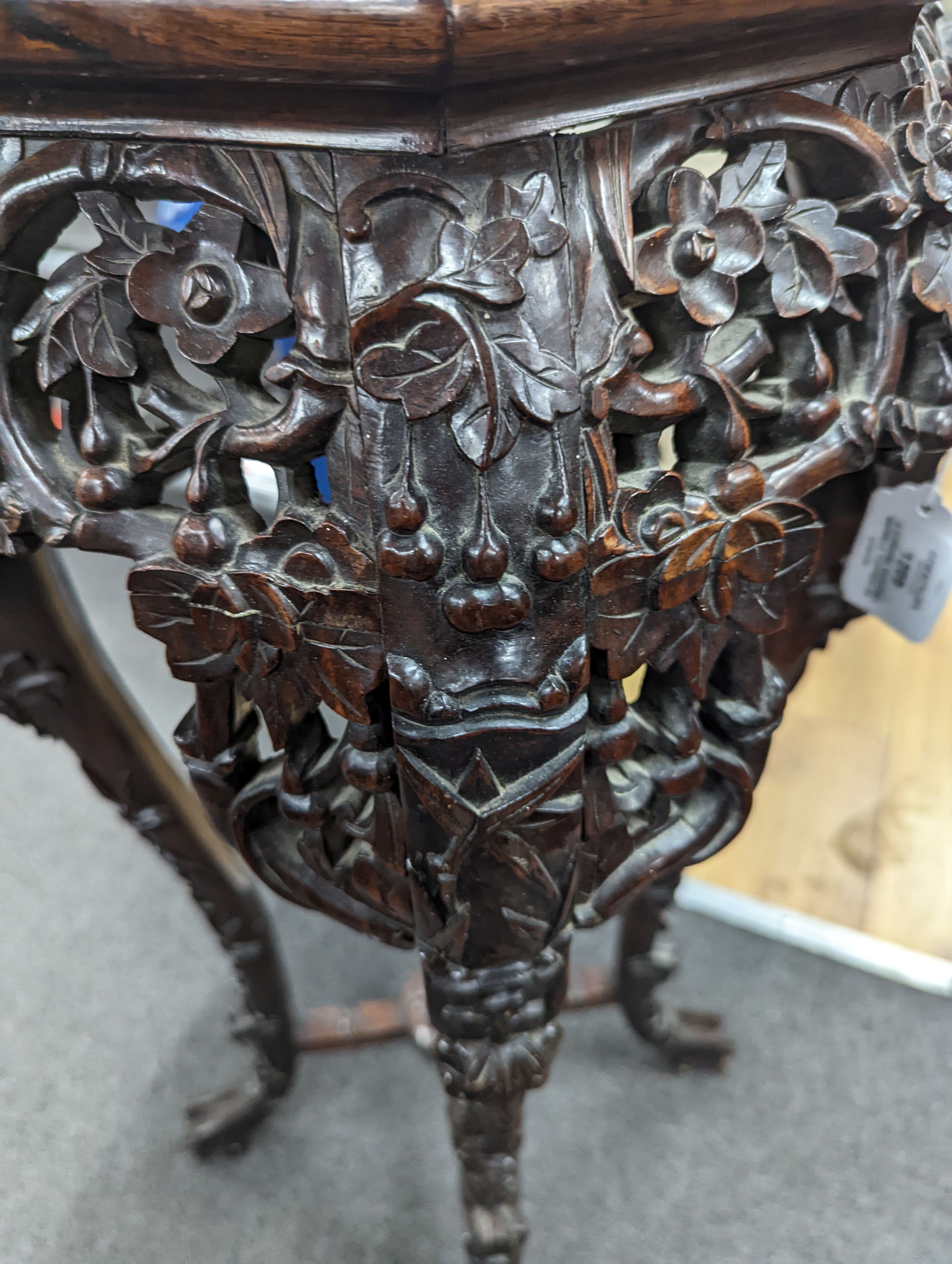 A Chinese hongmu marble topped jardiniere stand, early 20th century, height 90cm